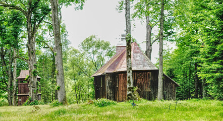 a small wooden church and a belfry. Eastern Poland, Bieszczady