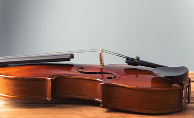 Naklejka na ściany i meble classical violin on wooden table