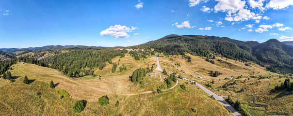Aerial panorama of Rhodope Mountains and village of Stoykite, Bulgaria