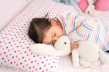 Little girl taking a nap.