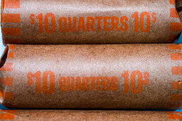 Rolls of US quarters shot from above