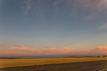Beautiful sunset sky over a prairie landscape