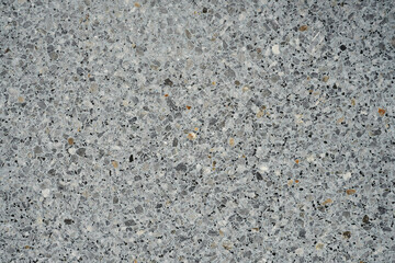 A wall of granite crumbs is like a background.