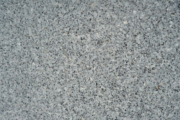 A wall of granite crumbs is like a background.