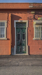 Fototapeta na wymiar Old wood main door of house in Lisbon