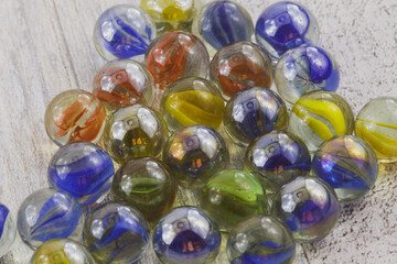 colored glass marbles on a table