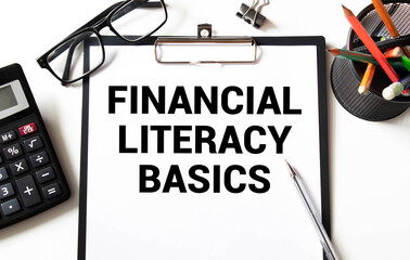 text Financial Literacy Basics text on back of an envelope.