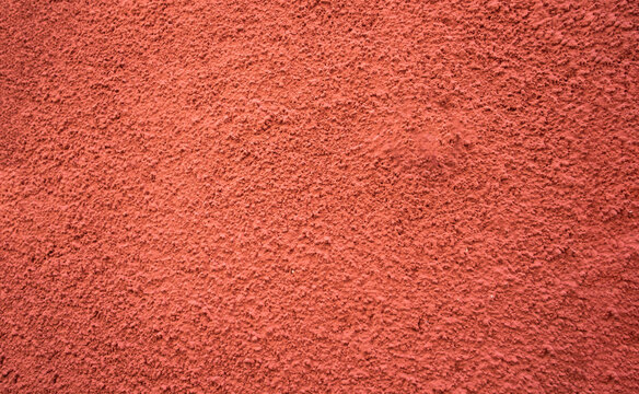 terracotta colored rough granulated paint texture, gotele, wine color
