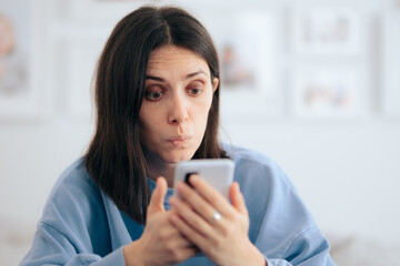 Funny Woman Holding Smartphone at Home