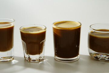 Milk coffee in transparent glass
