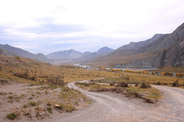 Field roads descend from the hill to the village, which stands on the banks of a beautiful river...