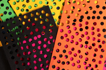 Circle perforated design in papers.