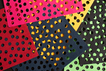 Holes punched papers texture, background.