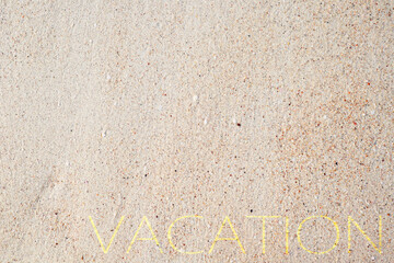 Summer Vacation and Travel Holiday or brandner Concept, Top view of Sand background on the beach with Yellow vacation wording