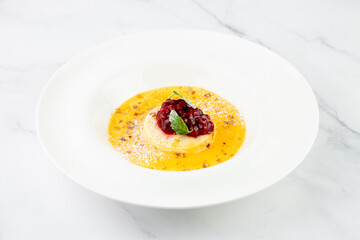 Ginger pumpkin soup with dumplings and berries. White background