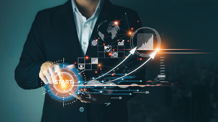 Concept of startup business to be successful, Businessman touch tablet screens, business icons and network connections on global modern interface. © Thapana_Studio