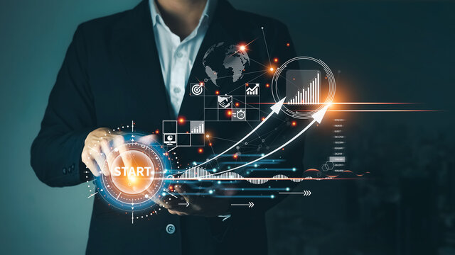 Concept of startup business to be successful, Businessman touch tablet screens, business icons and network connections on global modern interface.