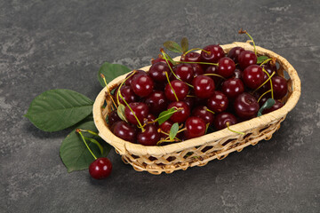 Sweet ripe cherry with leaves