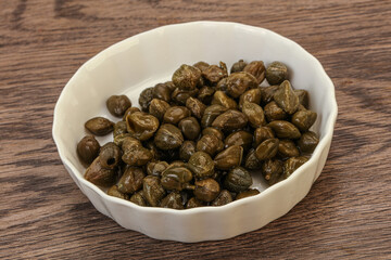 Tasty capers in the bowl