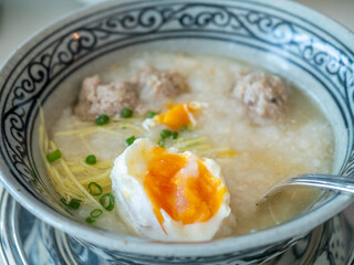 Boiled rice with pork and egg