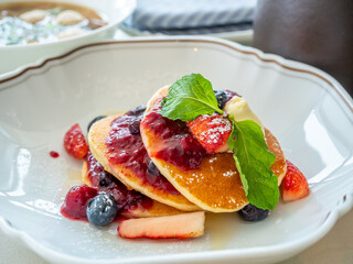 Pancakes with jam in luxury hotel