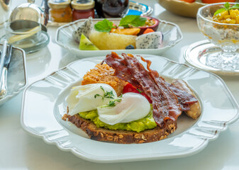 Breakfast benedict eggs in luxury hotel