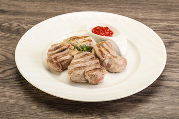Grilled pork tenderlion with tomato sauce