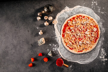 Top view on semi finished neopolitan pizza with cheese and tomato sauce