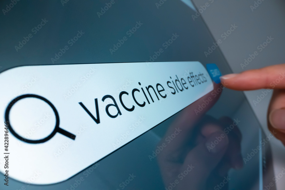 Canvas Prints close-up view of searching information about covid vaccine side effects on the internet, shot with m
