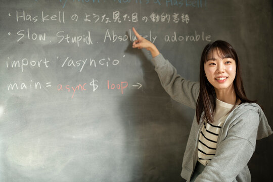 Young Female Teacher at Platform