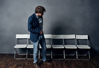 man waiting for job interview on chair lifestyle Professional
