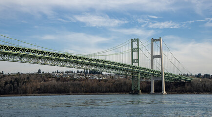 East side of the Tacoma Narrows Bridges as seen while boating on Puget Sound.