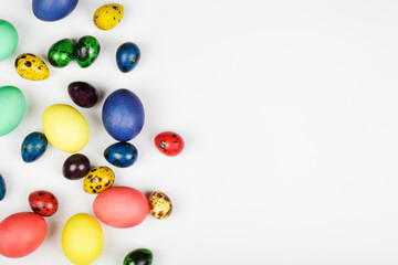 colorful easter eggs on white background. top view flat lay copy space. Easter concept.
