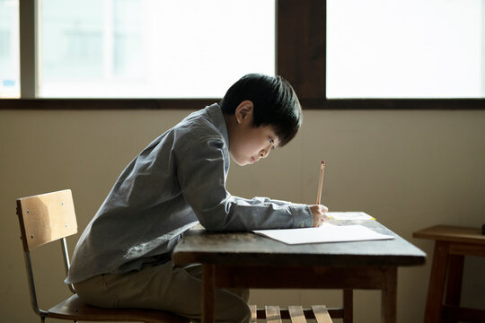Boy Transcribing