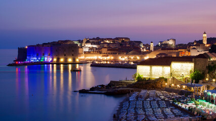 View of the old medieval stone city walls and towers at dawn. Dubrovnik. Croatia.