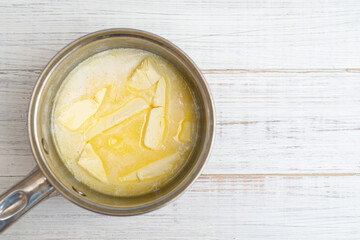 Melt the butter in a saucepan. Cooking ghee.