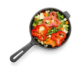 Frying pan with tasty vegetables on white background