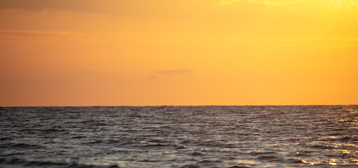 Horizon on the sea at sunset.