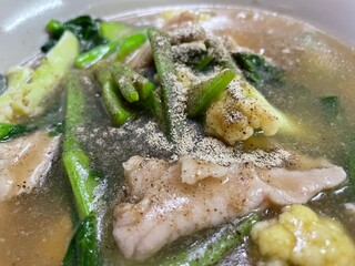 Thai Noodles Close up Noodles Fried noodle with pork and Kale in Gravy sauce