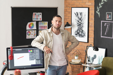 Male designer working in office