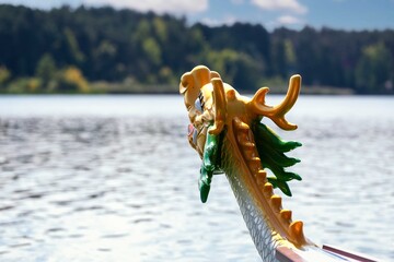 Dragon head on Dragon boat. Chinese dragon boat festival. Traditional Chinese paddled watercraft activity for over 2000 years - 422911439