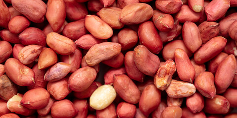 Obraz premium Close up of peanut nuts as background. Macro