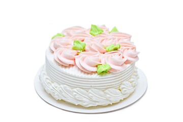 Cake top decorated pink flowers,  isolated on white background