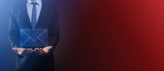 Businessman hand holding e-mail icon, Contact us by newsletter email and protect your personal...