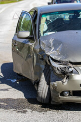 Destroyed car in car crash traffic accident on road