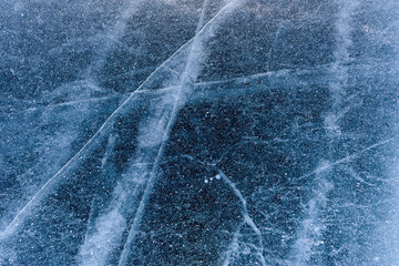 Beautiful ice of Lake Baikal with abstract cracks