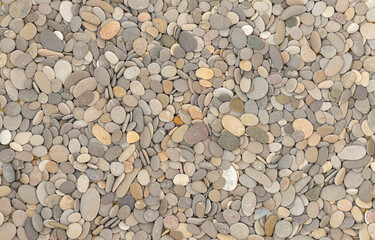 Natural background of small sea shore stones 