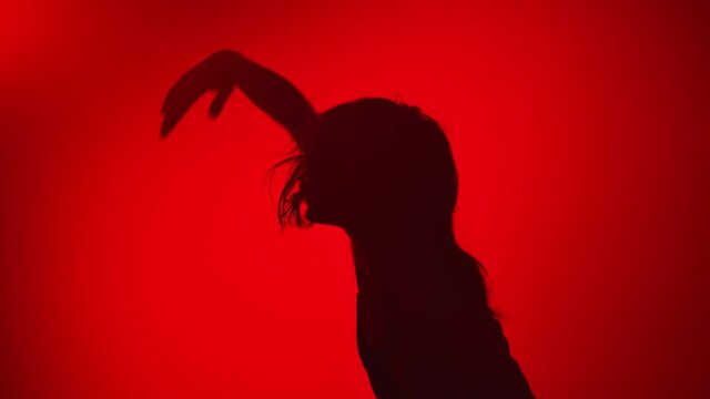 Sensual feminine dancer performing contemporary choreography. Medium close up shot on 4k RED camera