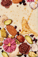 Handmade white chocolate with dried fruits and nuts