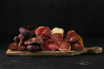 Assortment of dry-cured beef meat and sausages